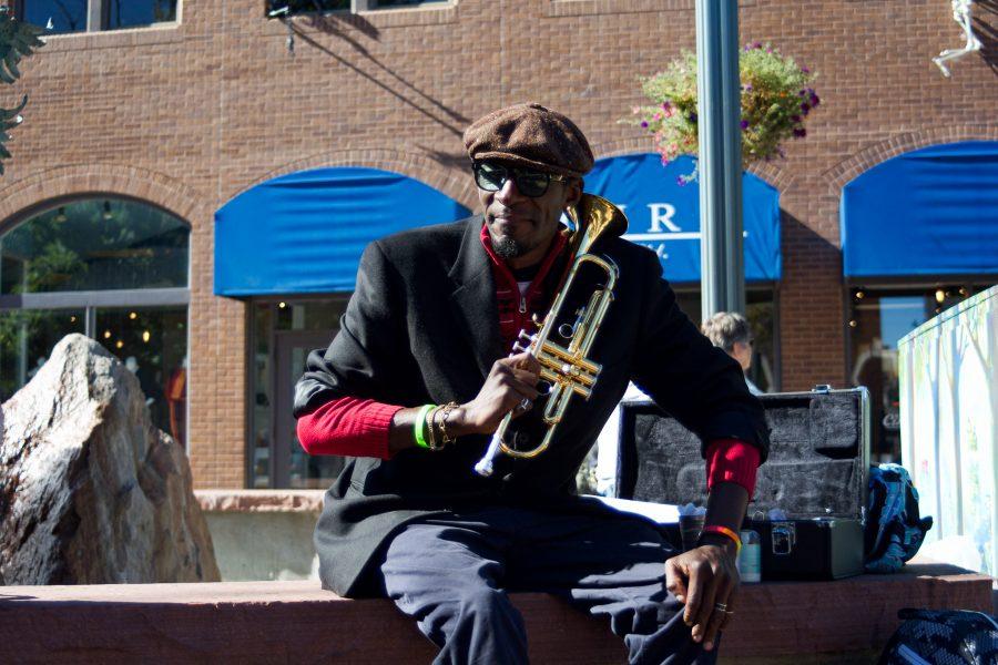Juan Lee Reed, artist name Fuziion age 43 sits in his usual spot in Old Town