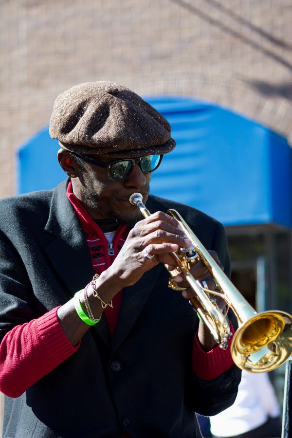 Juan Lee Reed, artist name Fuziion age 43 plays the trumpet in Old Town