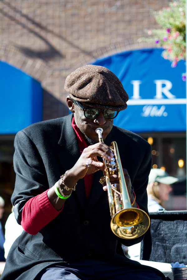 Juan Lee Reed, artist name Fuziion age 43 plays the trumpet in Old Town