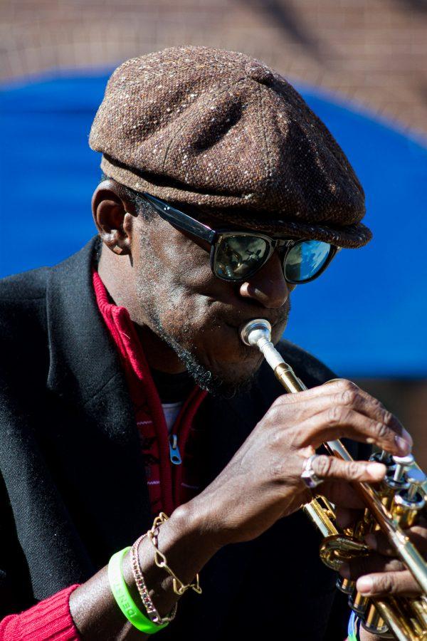 Juan Lee Reed, artist name Fuziion age 43 plays the trumpet in Old Town