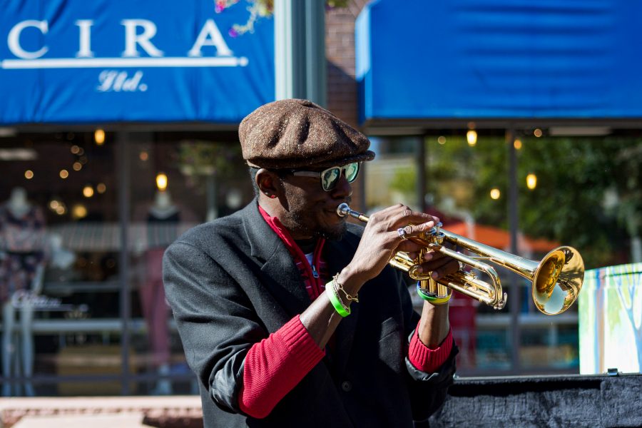 Juan Lee Reed, artist name Fuziion age 43 plays the trumpet in Old Town