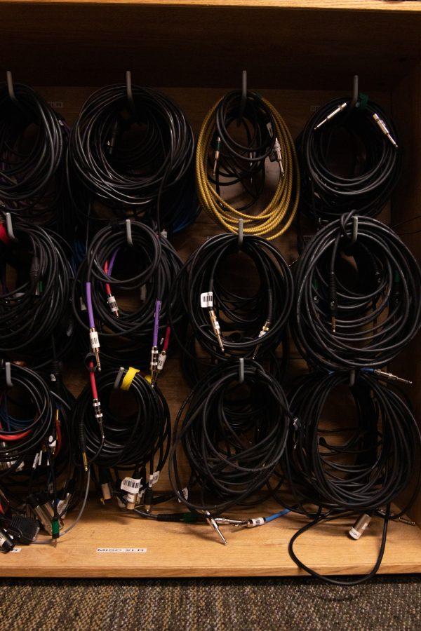 The tamed wires beside Ben Haney’s desk, the assistant podcast director at Colorado State University Oct 11. (The Collegian | Grayson Reed)