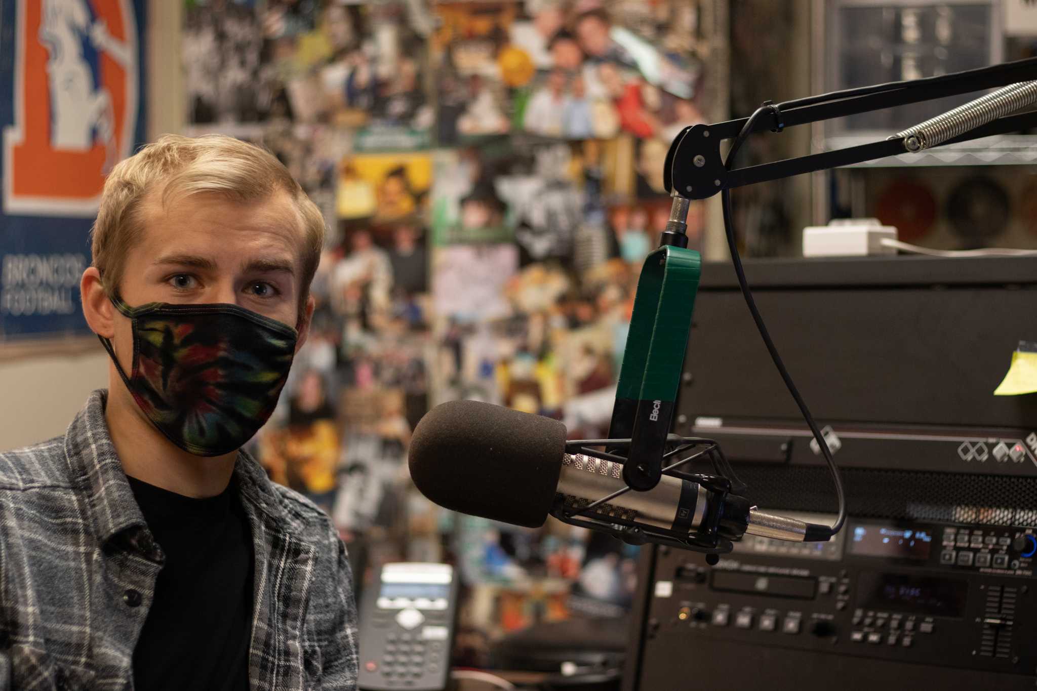 Ben Haney, assistant podcast director at Colorado State University, at his desk behind the DJ Booth under Lory Student Center Oct 11.