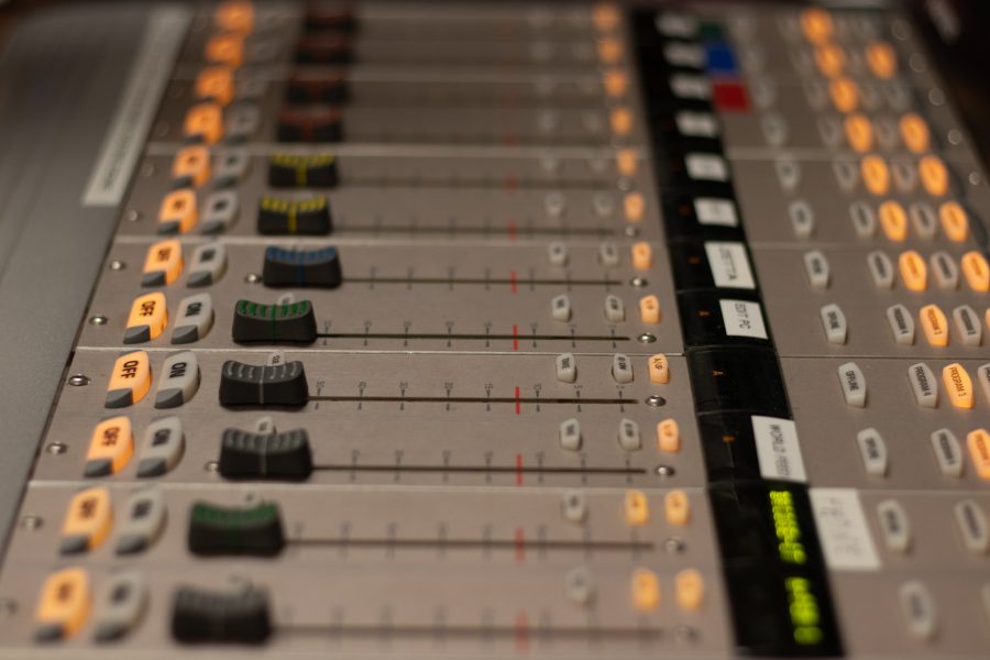 A sound board at Ben Haney’s desk behind the DJ Booth under Lory Student Center at Colorado State University Oct 11. When asked about Marie Tanksley Haney stated, “Her passion in the subject really drives me because she talks about story driven journalism on an audio format, you’ve only got one sense that you’re really bringing out in that kind of format and you need to be able to hone it into the max which is really cool.” (The Collegian | Grayson Reed)