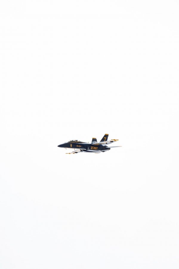 One of the United States Navy Blue Angel two-seater number 7s does a low pass while practicing for the Great Colorado Air Show at the Northern Colorado Regional Airport in Loveland Colorado Oct. 14. It has been 19 years since the Blue Angels last flew in Loveland and chose to do so on their 75th Anniversary. (Garrett Mogel | The Collegian)