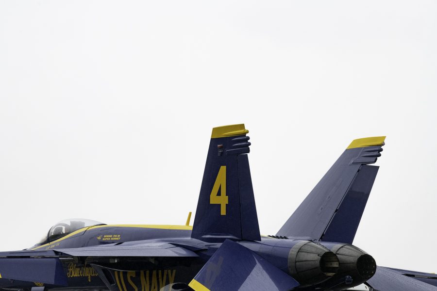 Lieutenant commander James Cox of the United States Navy Blue Angels sits in number four during a rainstorm at practice before preforming for the Great Colorado Air Show at the Northern Colorado Regional Airport in Loveland Colorado Oct. 14. It has been 19 years since the Blue Angels last flew in Loveland and chose to do so on their 75th Anniversary. (Garrett Mogel | The Collegian)