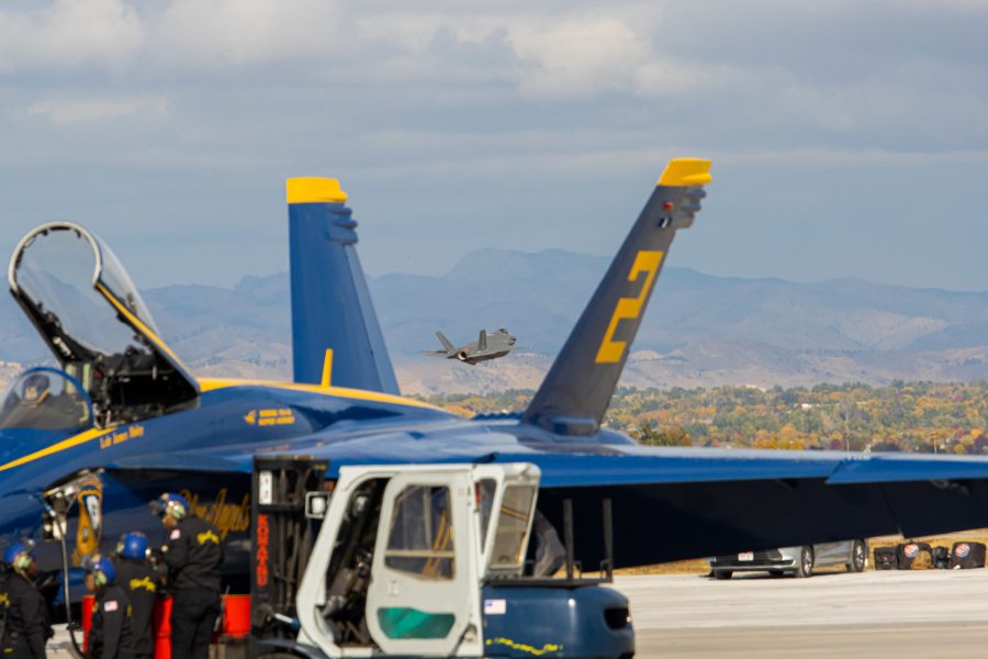An F-35A jet noses up after making a low pass