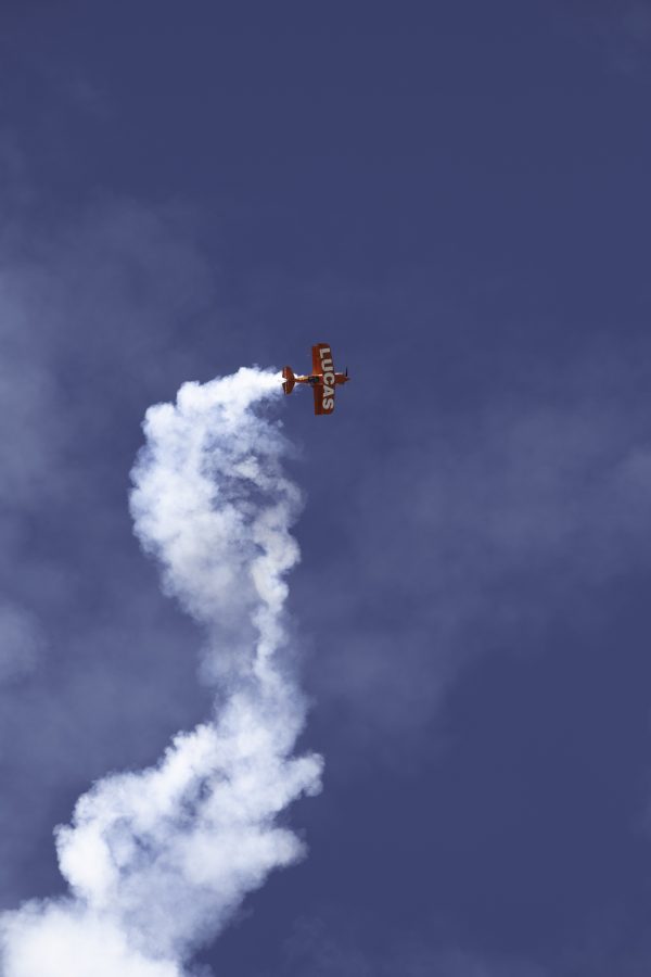 Michael Wiskus flies an aerobatic performance at the Great Colorado Air Show in a Super Stinker S-1-11B biplane Oct. 17. The airshow featured several performances, including the local Rocky Mountain Renegades and the United States Navy Blue Angels. (Garrett Mogel | The Collegian)