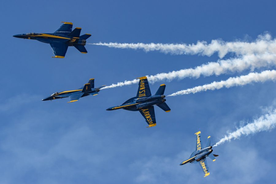Four of the U.S. Navy Blue Angels perform a break maneuver