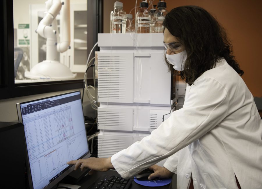 Jamie Cuchiaro studies a monitor in the new Cannabinoid Research Center in the Colorado State University Yates Chemistry building. The lab was a 1.5-million-dollar gift from CSU alumna Leslie Buttorff, CEO of Panacea Life Sciences. Buttorff stated, “What we want to do is find unique cannabinoids that can help people, natural remedies to get rid of big pharma medicine that people have.” Oct. 19. (Garrett Mogel | The Collegian)