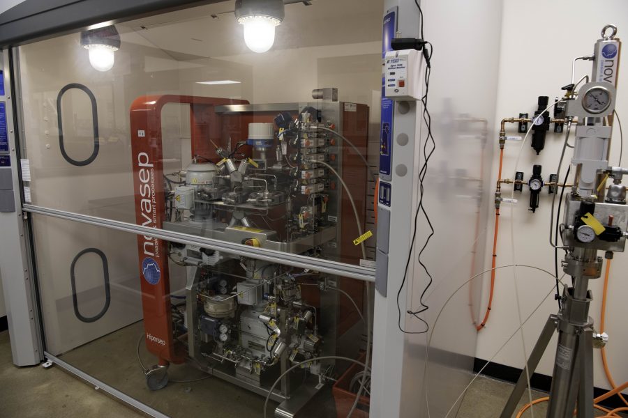 A chromatography machine known as the Novasep is placed in a fume hood at the new Cannabinoid Research Center the Colorado State University Yates Chemistry Building. The lab was a 1.5-million-dollar gift from CSU alumna Leslie Buttorff, Chief Executive Officer of Panacea Life Sciences. Buttorff stated, “If you look at the one thing about cannabis it needs a lot more research. And this lab is perfect for that.” Oct. 19. (Garrett Mogel | The Collegian)