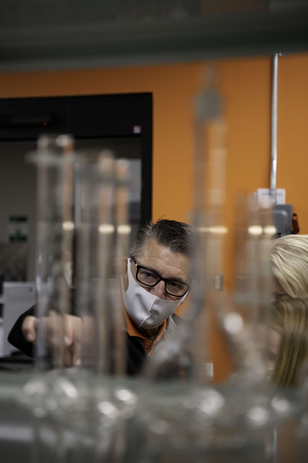 Nicholas Cavarra, Vice President of sales and Marketing at Panacea Life Sciences and Colorado State University alumna stands in the new Cannabinoid Research Center in the CSU Yates Chemistry Building. The lab was a 1.5-million-dollar gift from CSU alumna Leslie Buttorff, CEO of Panacea Life Sciences. Buttorff stated, “What we want to do is find unique cannabinoids that can help people, natural remedies to get rid of big pharma medicine that people have.” Oct. 19. (Garrett Mogel | The Collegian)
