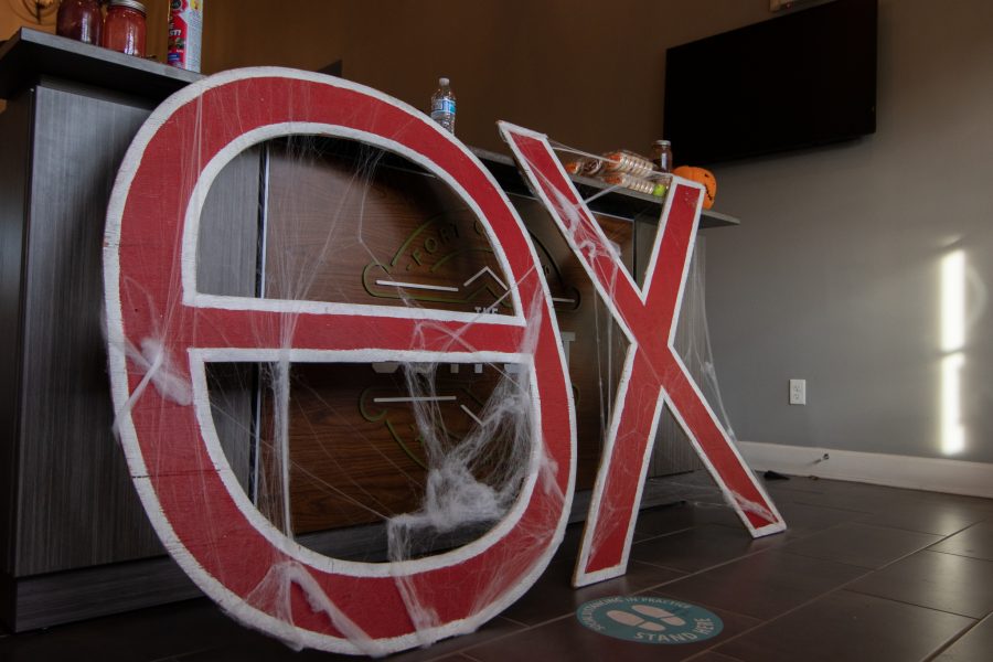 The entrance to the Theta Chi fraternity haunted house decorated with spiderwebs Oct. 22. The Colorado State University fraternity hosted the yearly haunted house to sponsor a fundraiser for the United Service Organizations. (Grayson Reed | The Collegian)