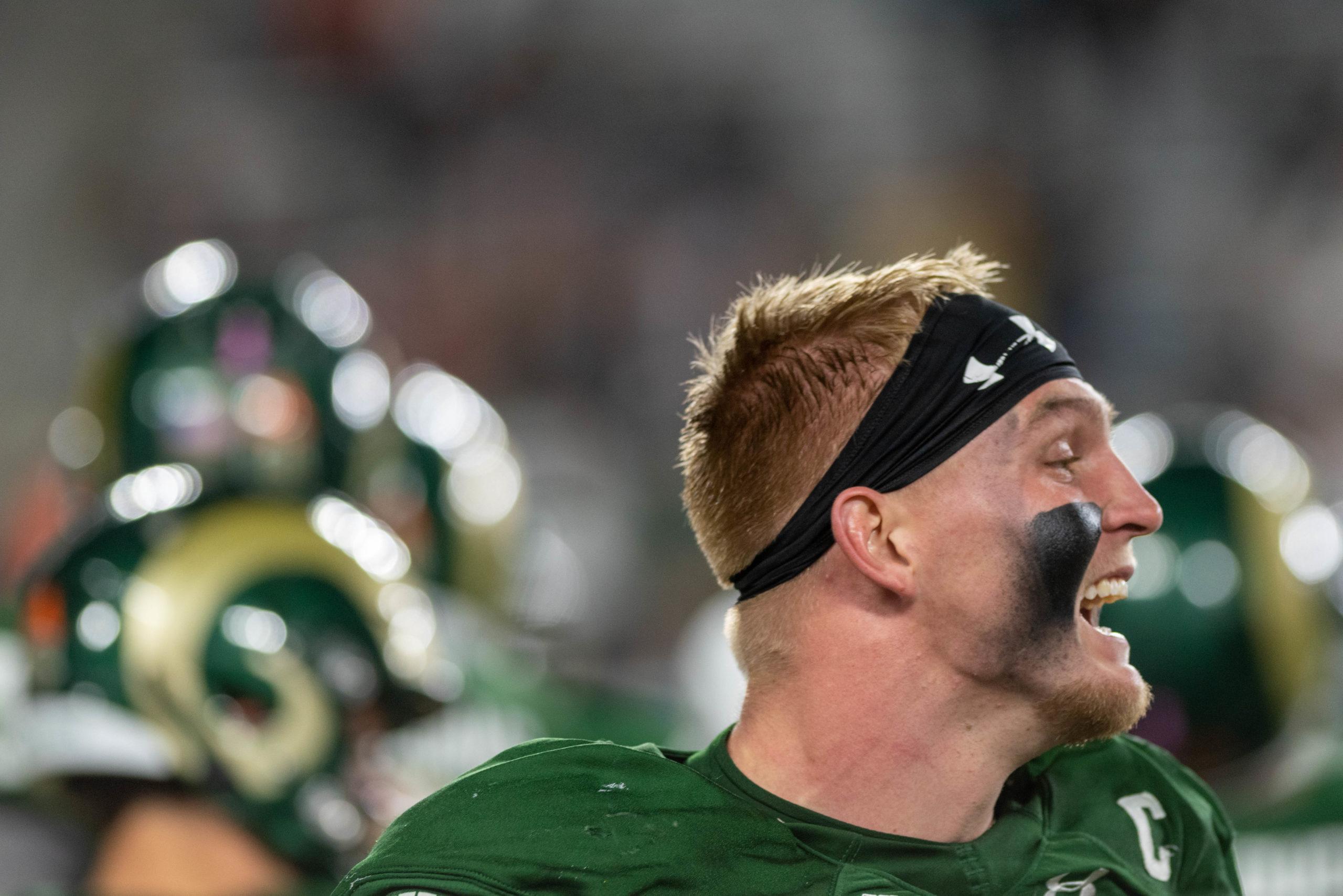 Trey McBride (85) celebrates on the sideline after the Colorado State University football team scored another touchdown during the game against Boise State University Ocy. 30th.