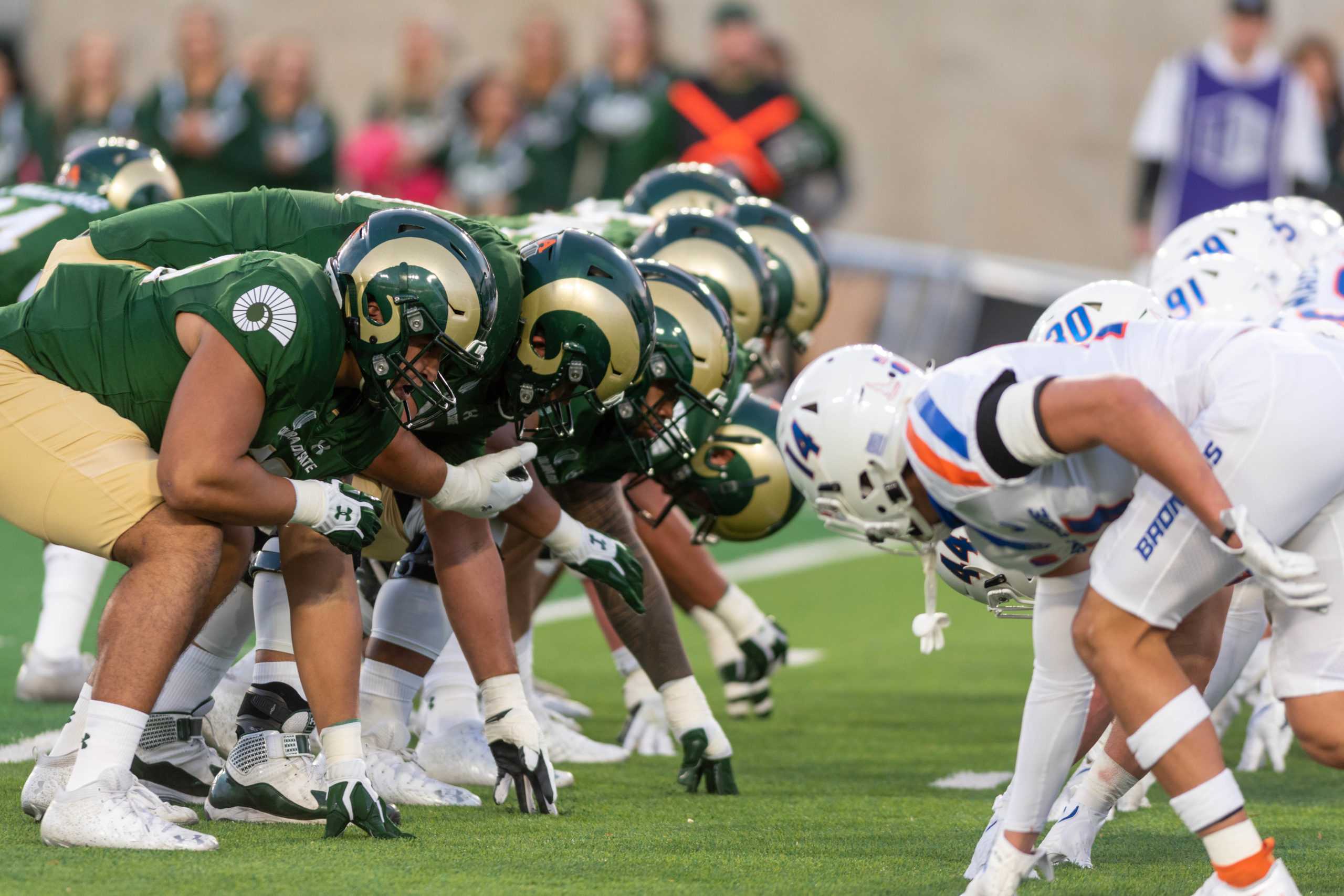 The Colorado State University offensive line faces off against the Boise State University defensive line in the football game in Fort Collins, CO. Oct 30th.