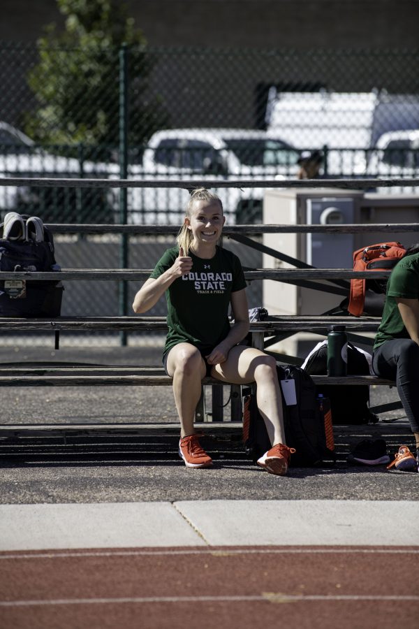 Lauren Gale gives a thumbs up before track practice at the Jack Christiansen Memorial Track Fort Collins Colorado. Gale after being away for the 2021 Tokyo Olympics stated, “I’ve missed Colorado and missed all my teammates and friend here so I’m excited to be back and run with the team.” Oct. 4. (Garrett Mogel | The Collegian)