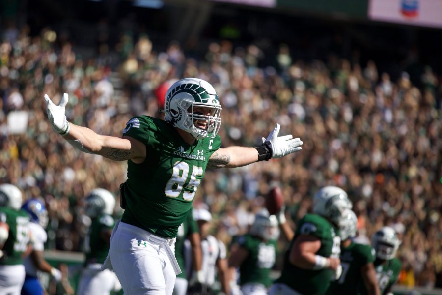 Trey McBride (85) celebrates after an early Colorado State University touchdown Oct. 9. (Ryan Schmidt | The Collegian)
