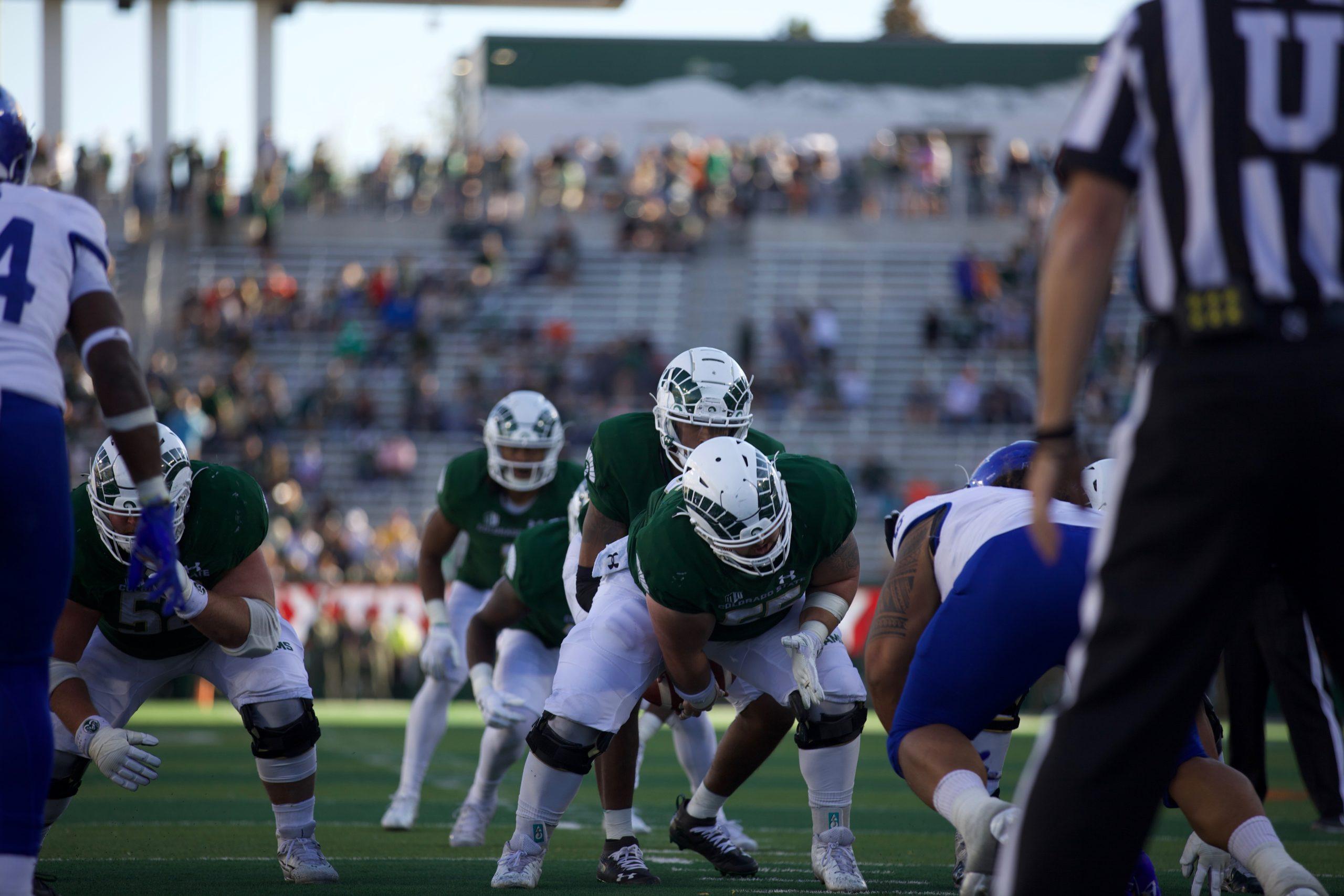 Cam Reddy snaps the ball to Todd Centeio Oct. 9.