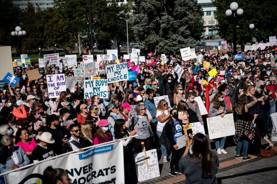 The crowd of protesters outside the Colorado State Capitol listens to speakers organized by the Denver Women’s March in reaction to the restrictive Texas abortion bill that went into effect last month, Oct. 2. (Lucy Morantz | The Collegian)