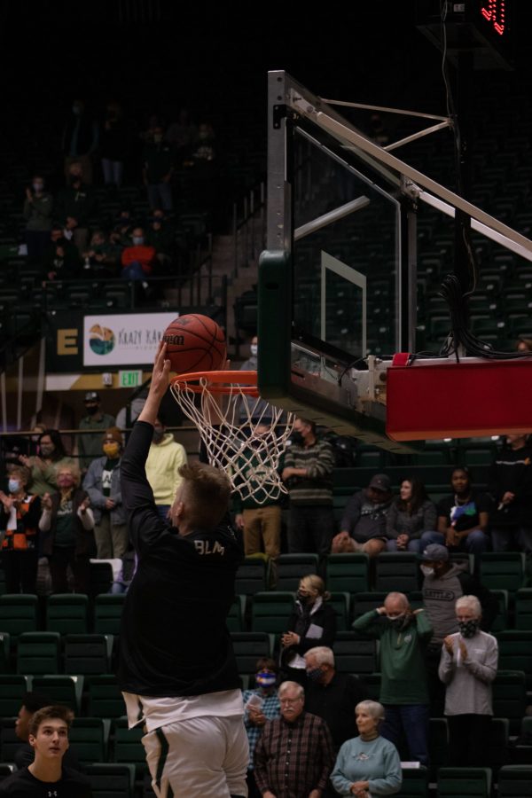 Colorado State University player warming up for the game against Adams State on Oct. 31. CSU beat Adams State 92-55 in the Moby Arena. (Mykyta Prykhodko | The Collegian)