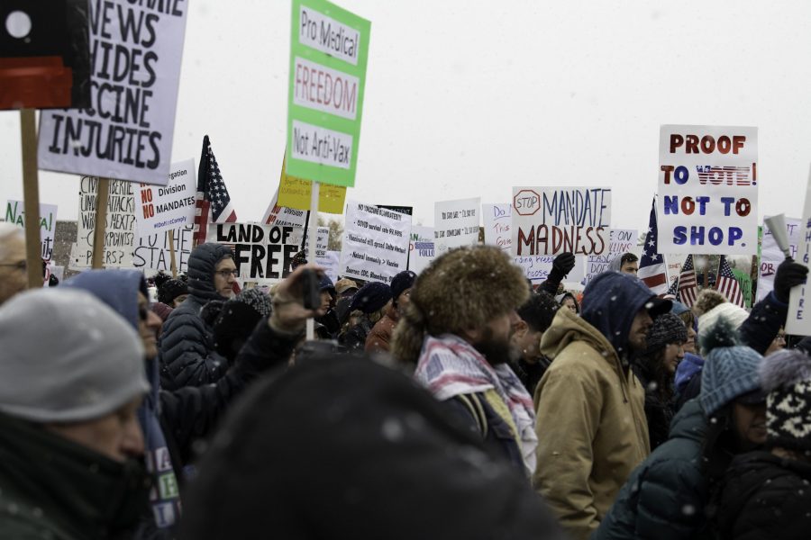 A group of rally-goers gather outside the Fort Collins Colorado Public Health Building Nov. 1. Individuals voiced concerns about varying topics including personal freedoms, vaccine mandates, and health policies. (Garrett Mogel | The Collegian) .