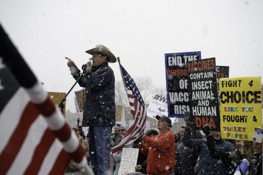 Mike Lynch candite for governor speaks at a rally against vaccine mandates. The rally took place outside the Larimer County Health Department Offices, 1525 Blue Spruce Drive Fort Collins Colorado. (Garrett Mogel | The Collegian)