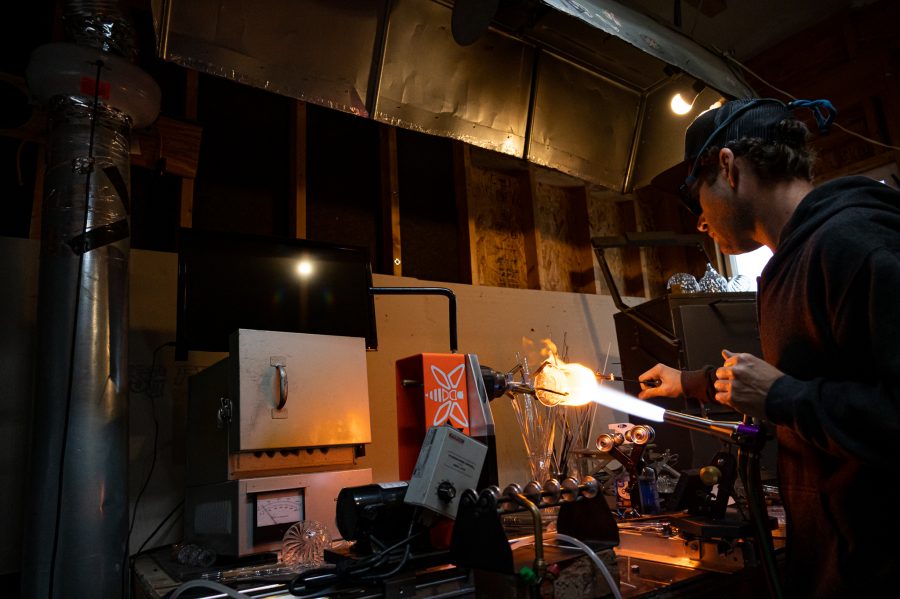 Bryan Ratcliffe heats up a mountain inspired drinking glass in his home studio