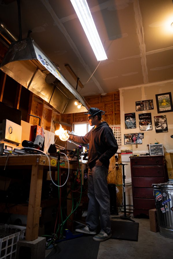 Bryan Ratcliffe turns up the heat while working on a new line of mountain inspired drinkware in his home studio
