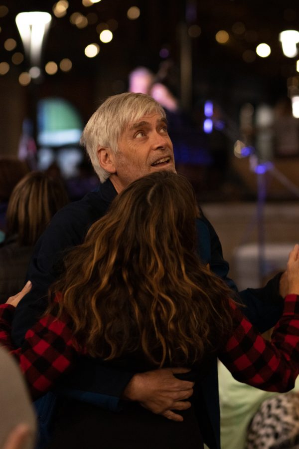 Bystanders dancing to the Atom Collective live jazz band at the Fort Collins, Old Town Square lighting ceremony Nov 5. (Grayson Reed | The Collegian)