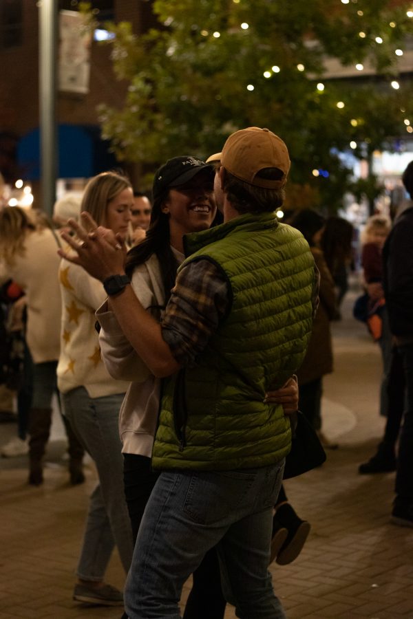 Bystanders dancing to the Atom Collective live jazz band at the Fort Collins, Old Town Square lighting ceremony Nov 5. (Grayson Reed | The Collegian)