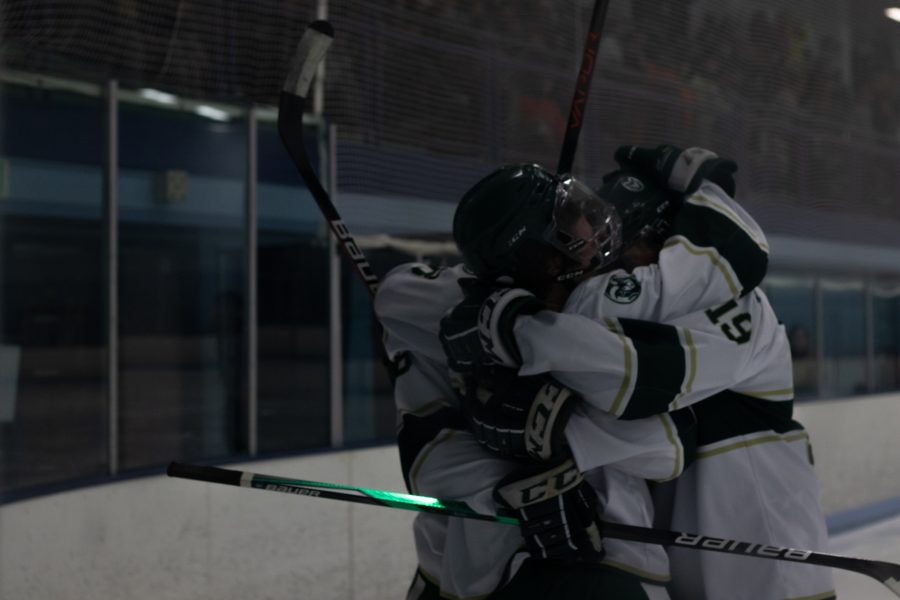 Kyle Nelson (19) Justin Rudrow (8) and Jackson Birdsall (18) of Colorado State University celebrate after a goal Nov 6. The game ended with University of Colorado winning 8-4 over CSU. (Grayson Reed | The Collegian)