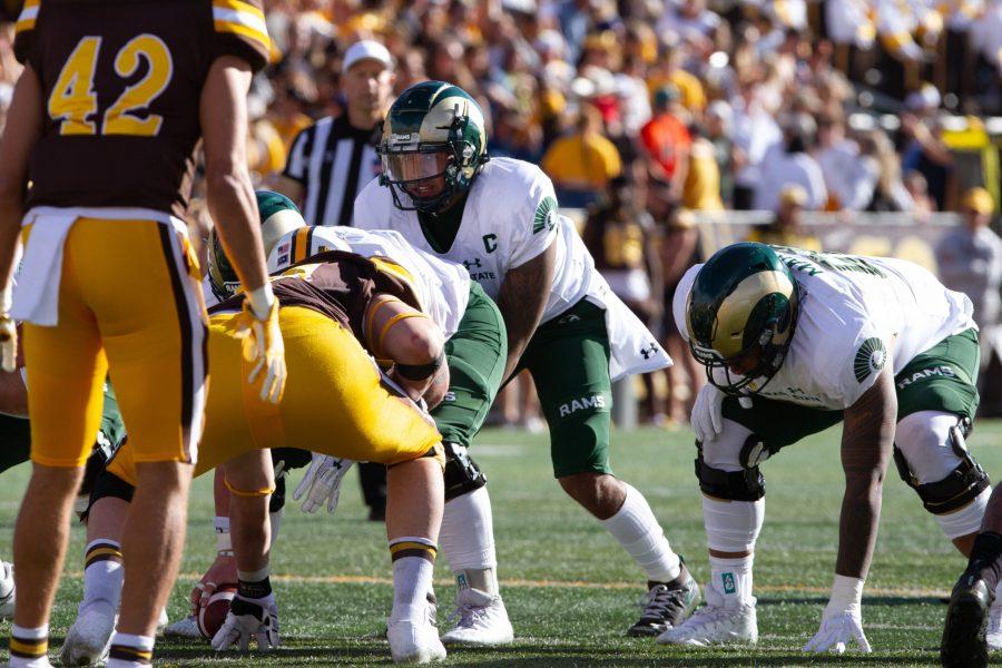 Former Colorado State University quarterback Todd Centeio (7) lines up in the Border War football game against the University of Wyoming
