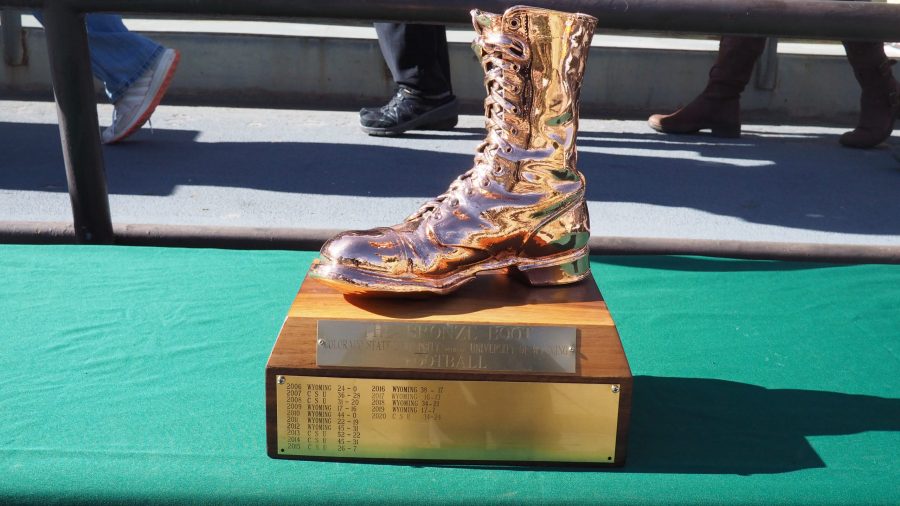 The Bronze Boot trophy sits on a table on the Colorado State sideline  before the CSU versus Wyoming Border War football game Nov. 6. The Boot stayed in Fort Collins last year following the 34-24 win by the Rams in the truncated COVID season. The result of 2021’s matchup was the polar opposite, a 31-17 trouncing of the Rams by the Wyoming cowboys in Laramie. (Gregory James | The Collegian)