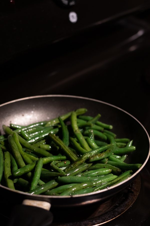 Green beans being prepared for dinner Nov 7. (Photo illustration by Grayson Reed | The Collegian)