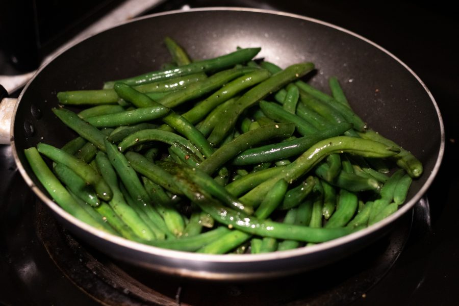 Green beans being prepared for dinner Nov 7. (Photo illustration by Grayson Reed | The Collegian)