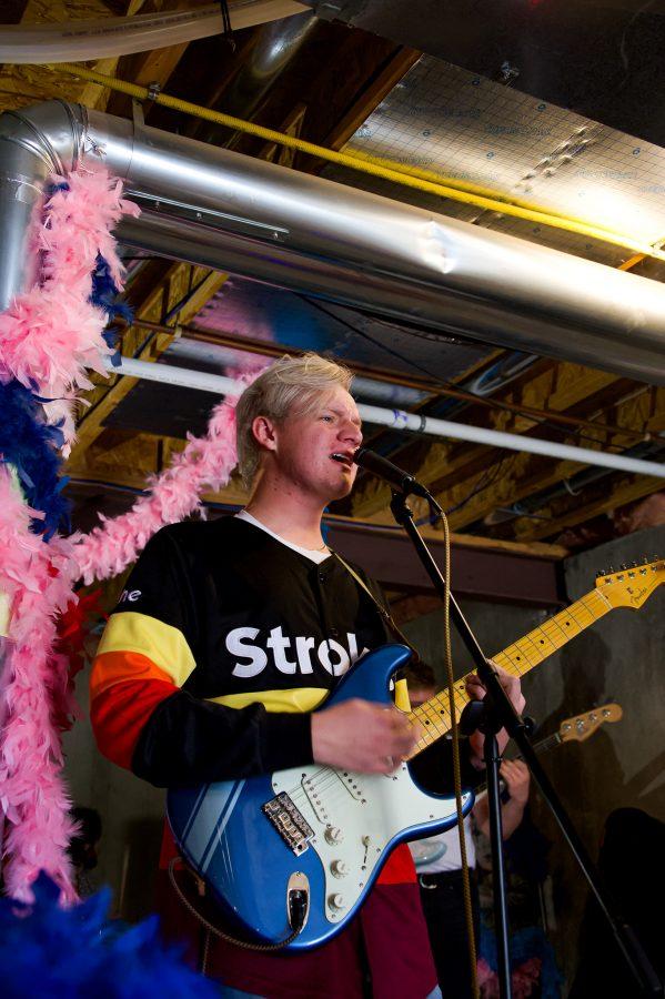 Violet Visionaries band member Jayden Yackey practices a song from the band's new EP Nov. 8. (Milo Gladstein | The Collegian)