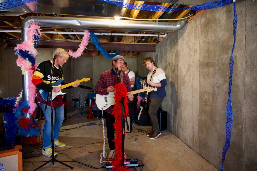 Violet Visionaries band members Jayden Yackey, Austin Dougherty, and Joshua Mcbride practice for their upcoming show Nov. 7. (Milo Gladstein | The Collegian)