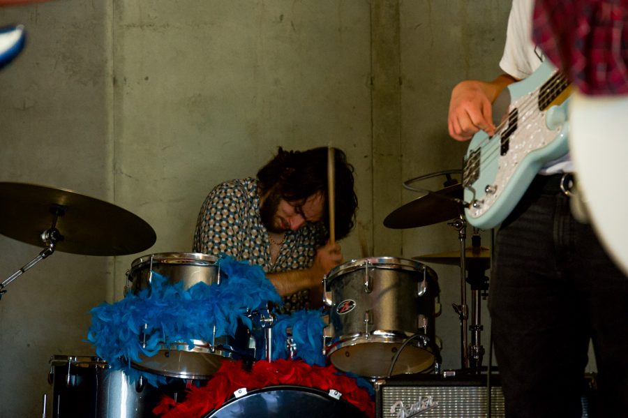 Andrew Roth of the Violet Visionaries practices the drums in their garage for the bands upcoming show at the Broadway Roxy Nov. 7. (Milo Gladstein | The Collegian)