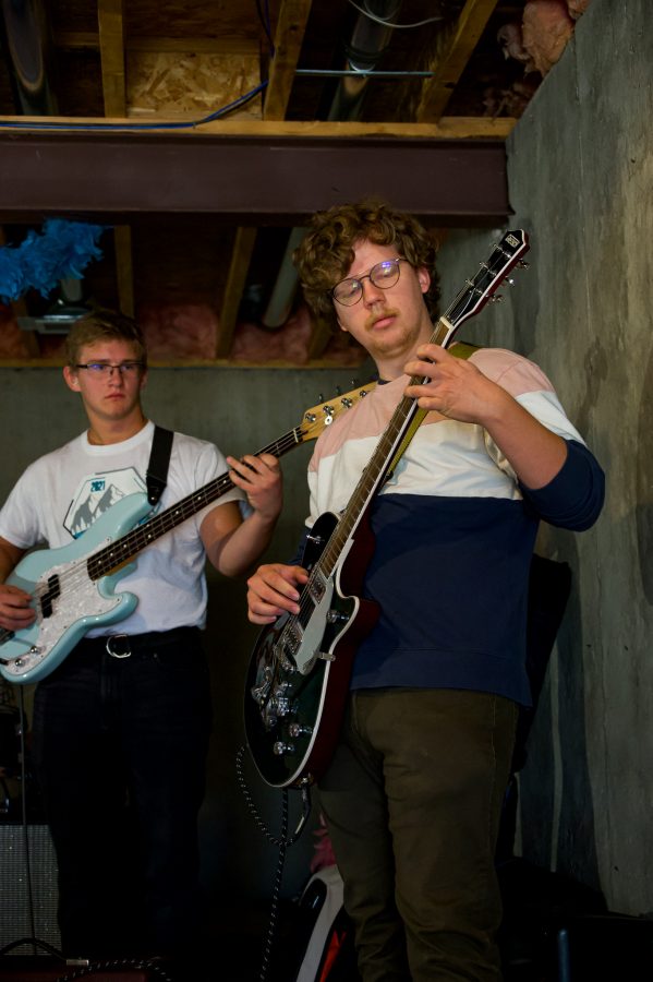 Violet Visionaries band members Garret Yackey and Joshua Mcbride practice new songs for the band's upcoming EP Nov. 7. (Milo Gladstein | The Collegian)