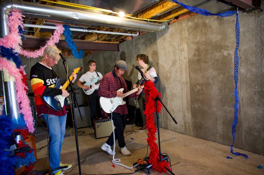 Violet Vissionaries band members Jayden Yackey, Garret Yackey, Austin Dougherty, and Joshua Mcbride practice for their upcoming show Nov. 7. They're new song is called "Enough" is about realizing you are enough after heartbreak. (Milo Gladstein | The Collegian)