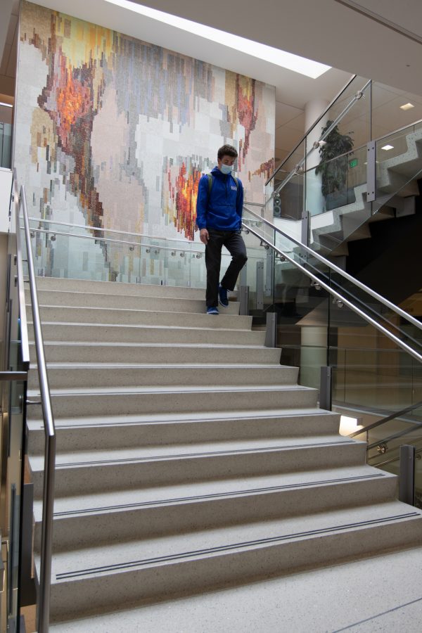 Photo recreation with Charlie Walter, a student at Colorado State University, of the staircase in Lory Student Center Nov 8. (Photo illustration by Grayson Reed | The Collegian)
