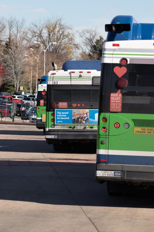 3 buses parked at the bus stop by the Lory Student Center Nov. 12. (Mykyta Prykhodko | The Collegian)