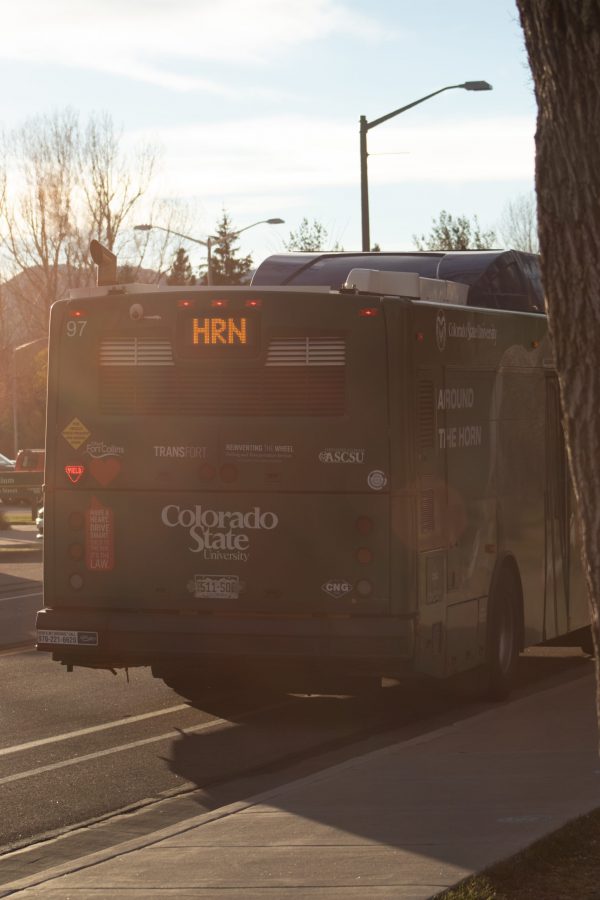 A bus stopped at a bus stop by the Canvas stadium Nov. 12. (Mykyta Prykhodko | The Collegian)