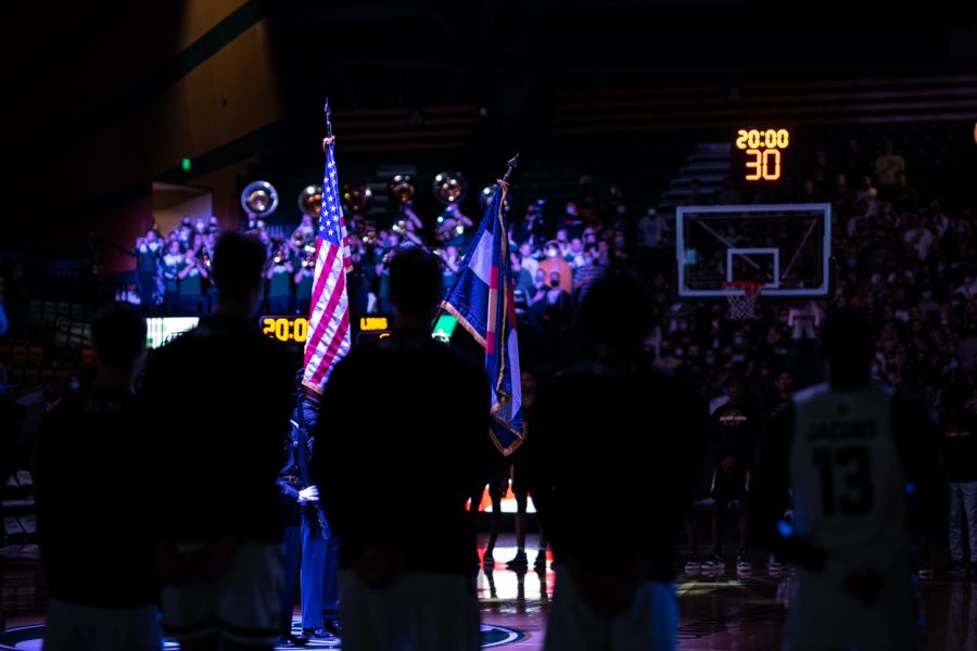 Before the starting lineups for the Rams and Lions were announced, players and fans watch the presentation of the colors by members of the National Guard Nov. 12. Colorado State University defeated the University of Arkansas at Pine Bluff 91-71. Photo by Lucy Morantz