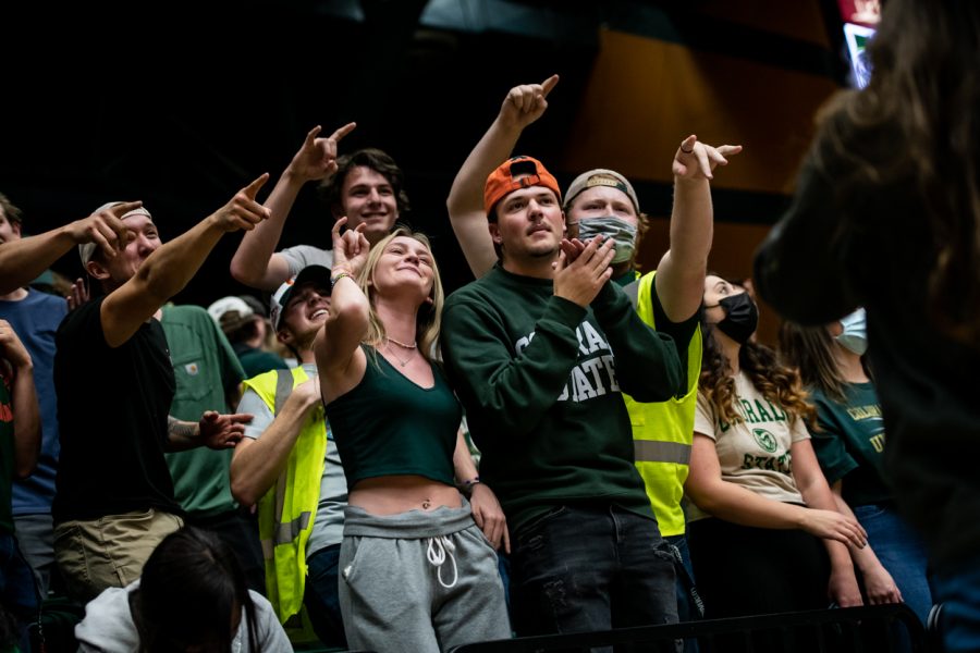 Colorado State University students in the front rows of the student section for a camera.