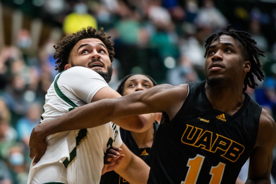 Junior David Roddy (21) fights off defenders from the University of Arkansas at Pine Bluff as a free-throw is shot Nov. 12. (Lucy Morantz | The Collegian)