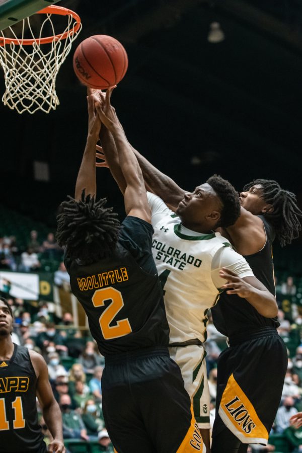 Junior Isaiah Stevens (4) goes up for a layup as University of Arkansas at Pine Bluff players attempt to block his shot Nov. 12. (Lucy Morantz | The Collegian)