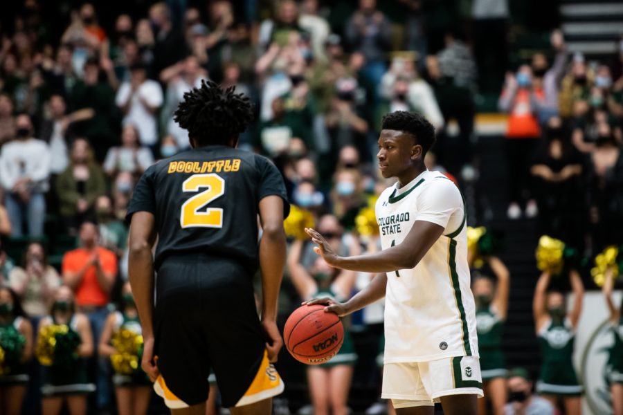 As the Rams led the Lions 91-71 with less than ten seconds left in the game, junior Isaiah Stevens (4) signals to teammates to let the clock run out Nov. 12. (Lucy Morantz | The Collegian)