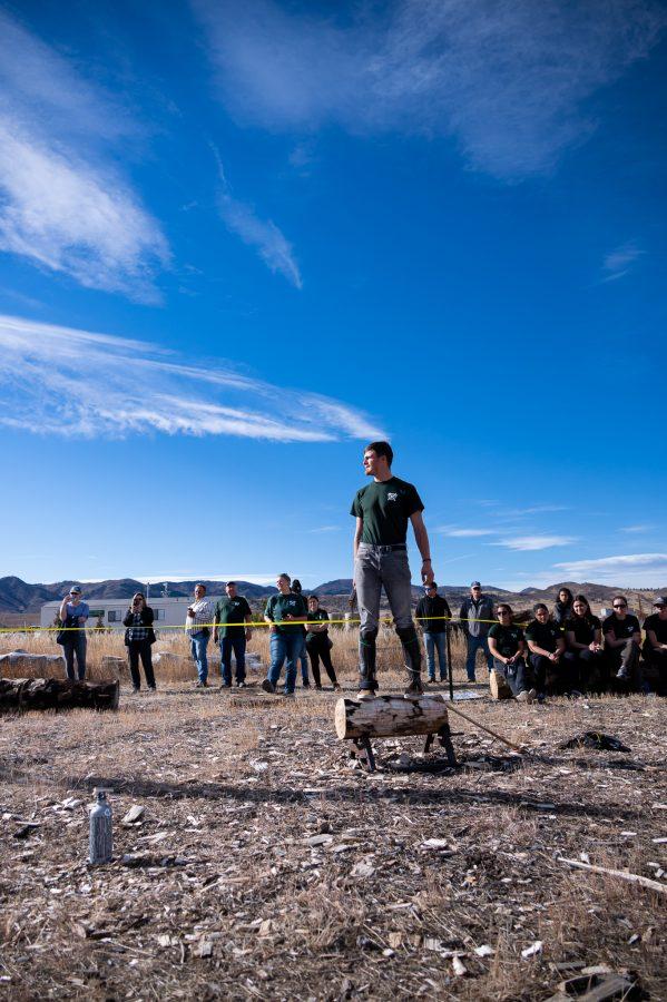Member of the CSU Logging team Riley Knap prepares for the underhand chop event Nov. 14. Lincoln Jacobway Travel and safety officer stated, "We hope to continue to grow as a team and become more involved around the United States." (Milo Gladstein | The Collegian)