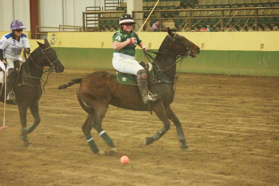 Player number 4 gets ready to perform a backshot before the opposing team gets the ball.